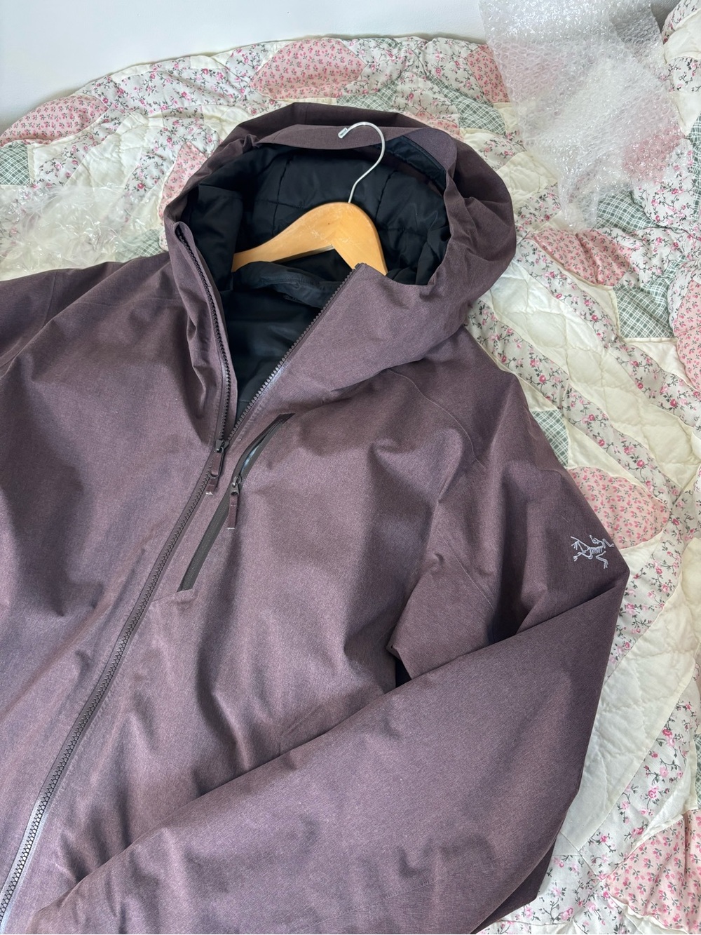 Brown arc’teryx jacket